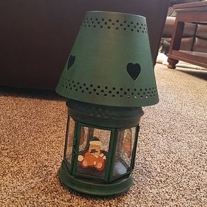 Decorative candle lamp with painted Santa